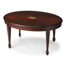 Clayton 38 in. W Oval Wood Coffee Table with Veneer Linen-Fold Inlay by Butler Specialty Company