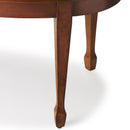 Clayton 38 in. W Oval Wood Coffee Table with Veneer Linen-Fold Inlay by Butler Specialty Company