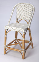 Solstice 25 in. Seat Height Rattan Counter Stool with Back and Footrest by Butler Specialty Company
