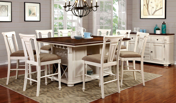 Dining room with a wooden table and chairs in a well-lit room.