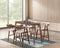 Wooden bar table with four stools in a modern kitchen setting